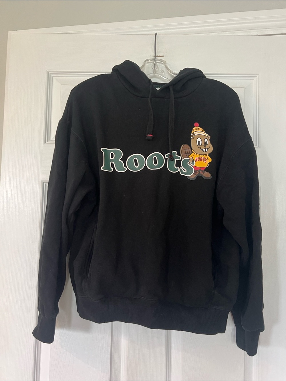 Roots Black Hoodie with Green Logo and Colorful Mascot
